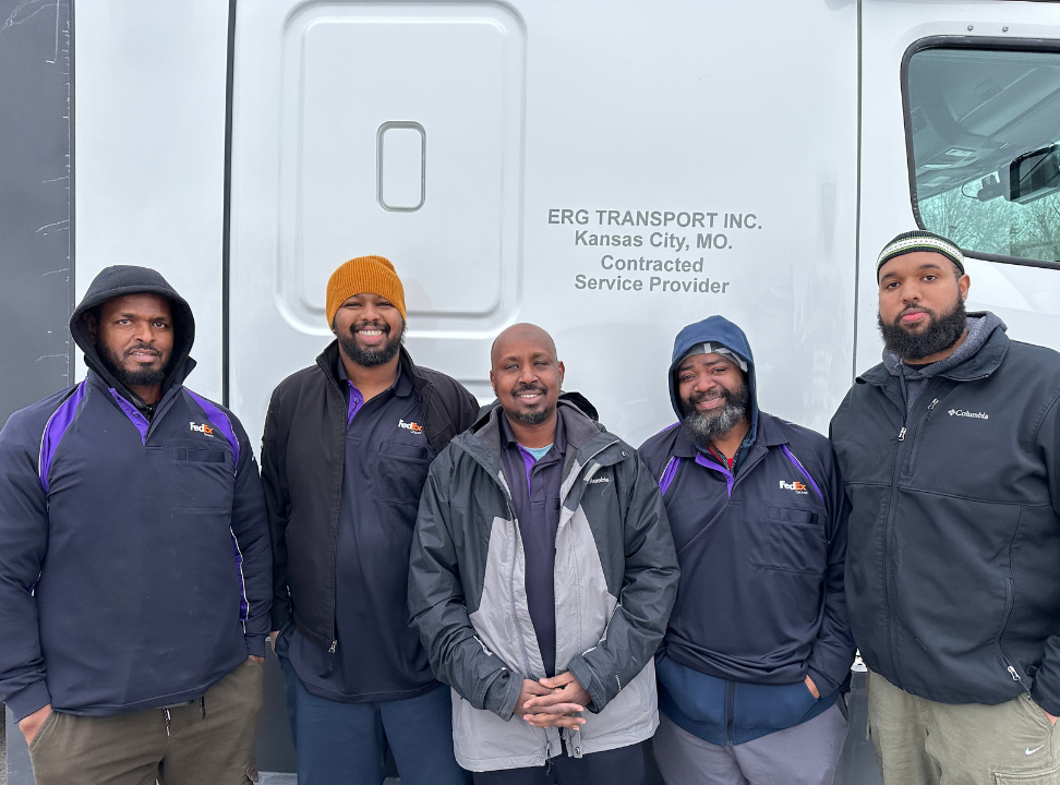 An Image of the ERG Team standing in front of company truck.